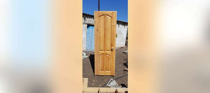Деревянная дверь в Домбаровском